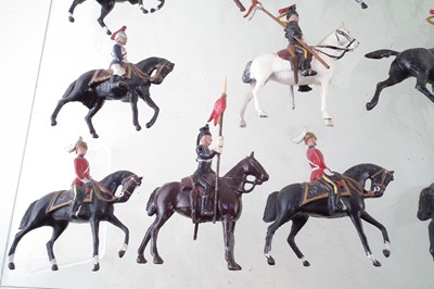 Lot 66 - Twenty nine metal British cavalry trooper toy soldiers including Lancers and Life Guards.