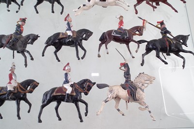 Lot 66 - Twenty nine metal British cavalry trooper toy soldiers including Lancers and Life Guards.