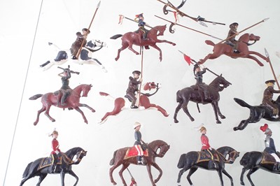 Lot 66 - Twenty nine metal British cavalry trooper toy soldiers including Lancers and Life Guards.