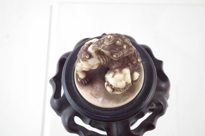 Lot 58 - Japanese Ivory netsuke carved as a karashishi
