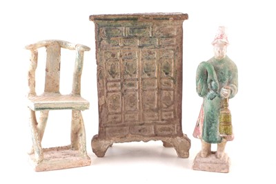 Lot 28 - Ming period Chinese pottery figure, a chair and a model wardrobe / cabinet