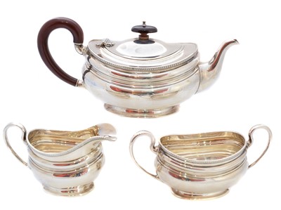 Lot 184 - A George VI silver three-piece teaset