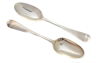 Lot 221 - A pair of George II silver table spoons