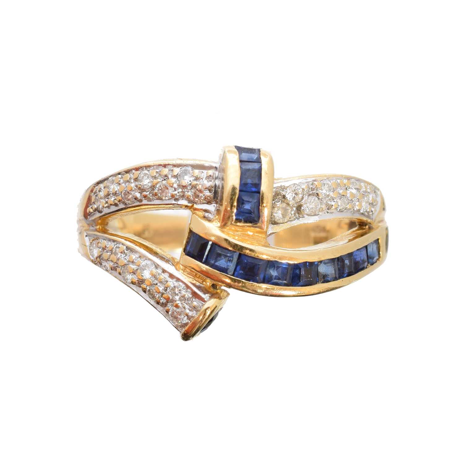 Lot 99 - A sapphire and diamond dress ring