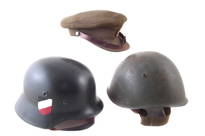Lot 268 - Italian WWII helmet, replica German helmet and a British REME Cap