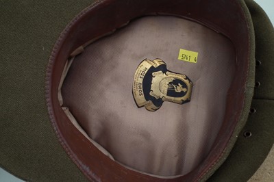 Lot 268 - Italian WWII helmet, replica German helmet and a British REME Cap
