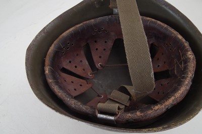 Lot 268 - Italian WWII helmet, replica German helmet and a British REME Cap