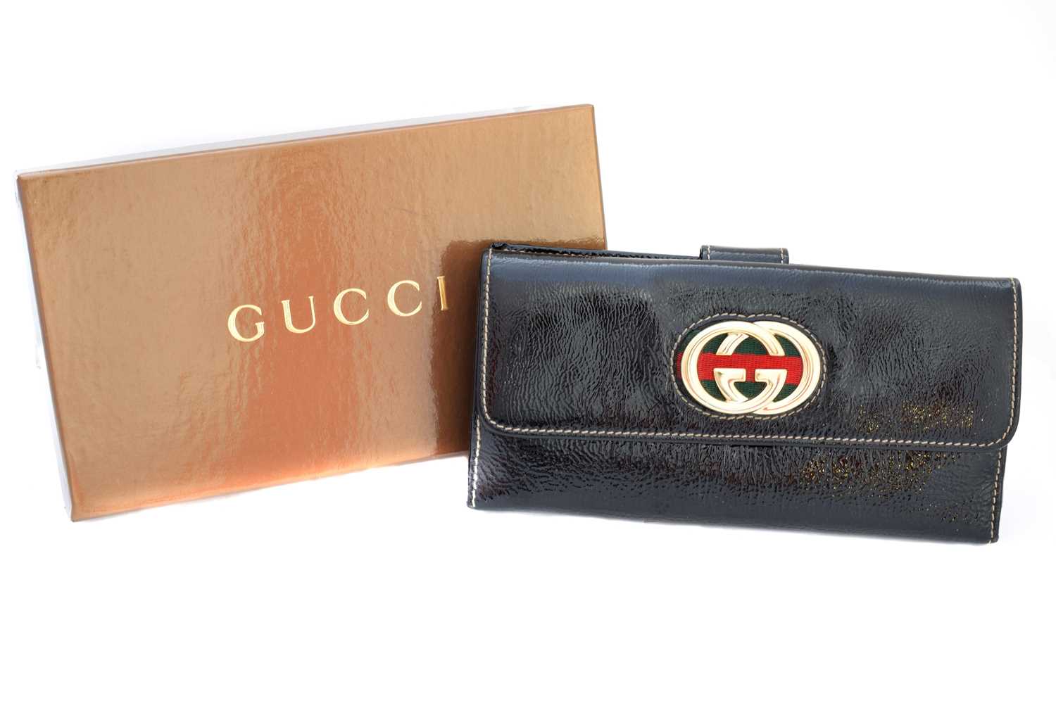 Lot 80 - A Gucci long wallet