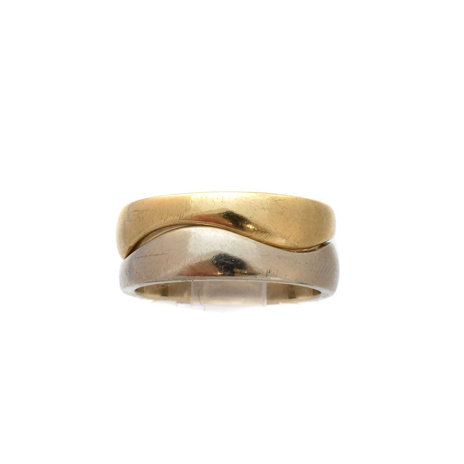 Lot 193 - A pair of 18ct gold stacking 'Wave' rings by Cartier