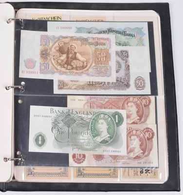 Lot 31 - One album of assorted world banknotes.