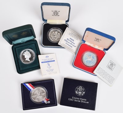 Lot 16 - An assortment of historical/ world coinage to include cased Royal Mint Silver Proof Crowns.