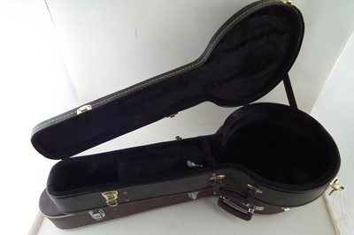 Lot 15 - Two Banjo cases and a autoharp