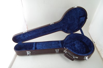 Lot 15 - Two Banjo cases and a autoharp