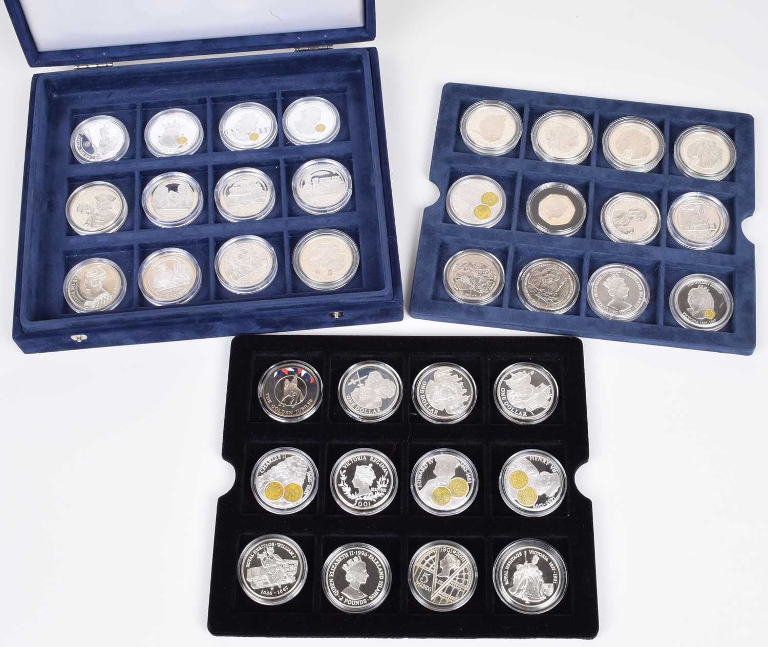 Lot 14 - Cased set of 36 silver proof coins to include many commemorative sized crowns, fifty pences etc.