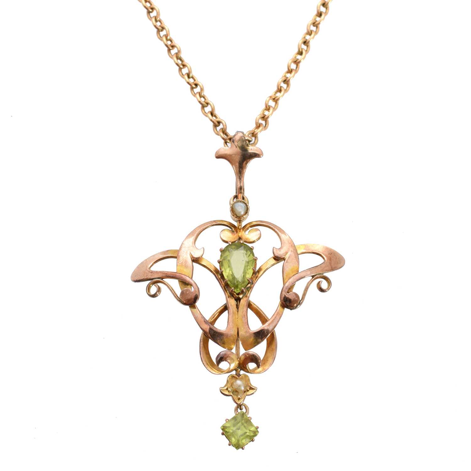 Lot 107 - An early 20th century peridot and seed pearl pendant