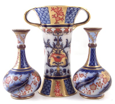 Lot 159 - Matched garniture of three Macintyre vases