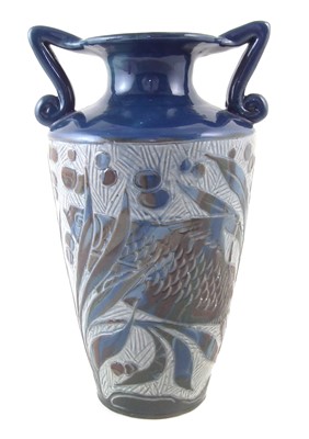 Lot 264 - Lauder Barum twin handled vase, moulded with fish.