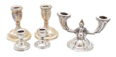 Lot 173 - A selection of silver candlesticks