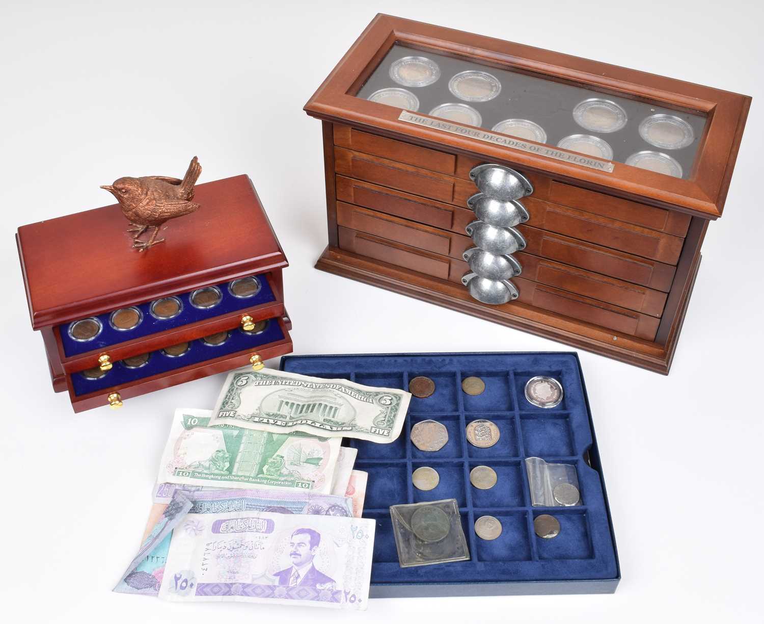 Lot 6 - Three Danbury Mint presentation sets and small assortment of coins and banknotes.