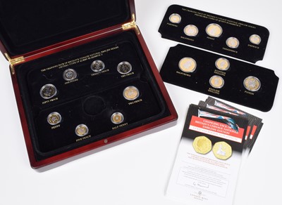 Lot 8 - A cased set of twelve hallmarked silver gilt medallions and other cased gold-plated coin sets.