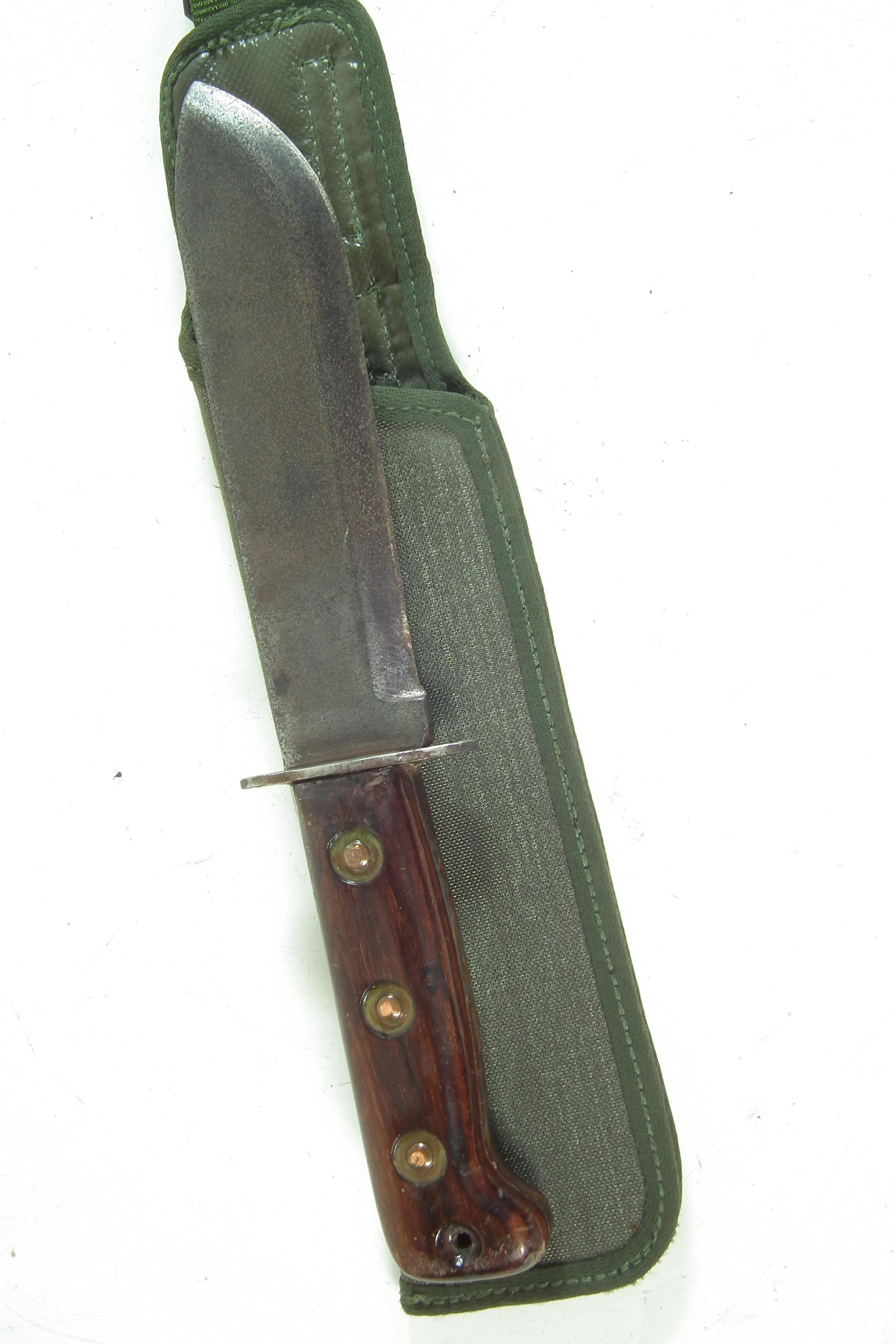 Lot 402 British Army survival knife,