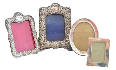 Lot 209 - Four silver picture frames