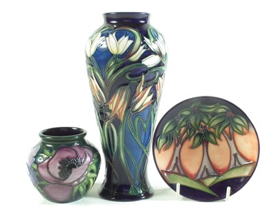 Lot 134 - Two Moorcroft vases, and a pin dish