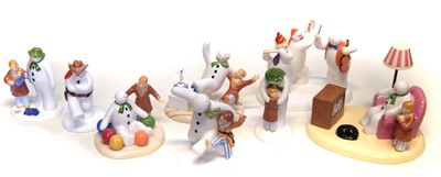 Lot 98 - Seven boxed Coalport Snowman figures and a Royal Doulton model