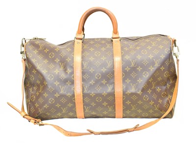 Lot 45 - A Louis Vuitton monogram Keepall Bandoulière 55 luggage bag