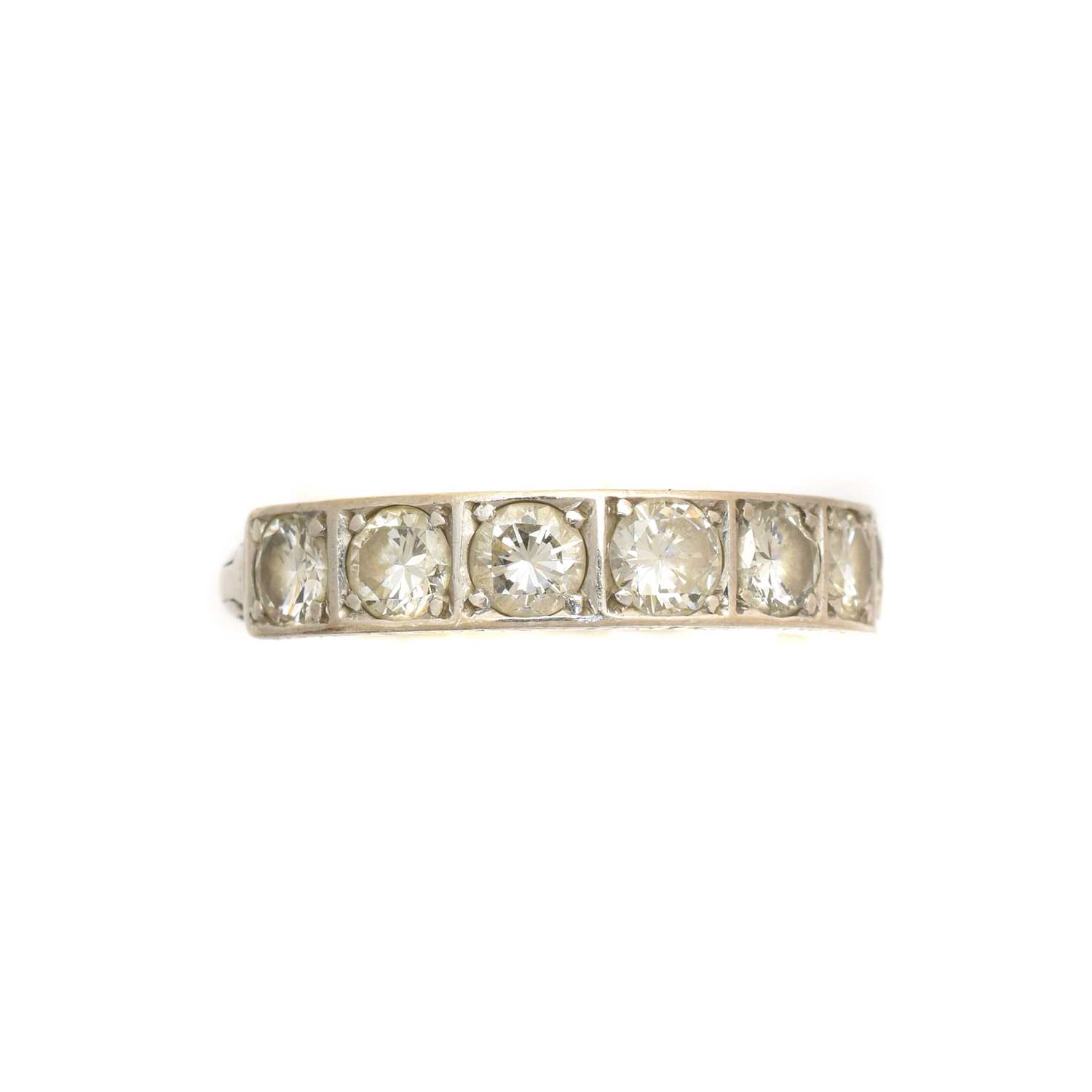 Lot 215 - A diamond band ring