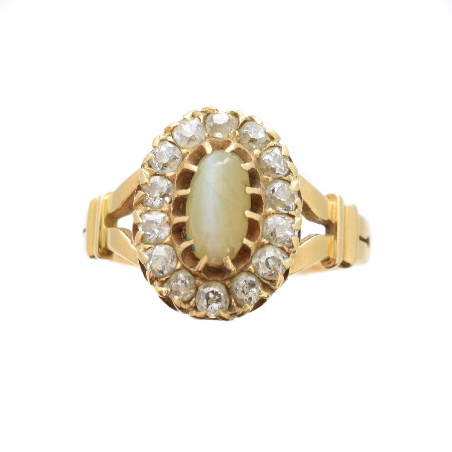 Lot 185 - A Victorian 18ct gold cat's eye chrysoberyl and diamond cluster ring