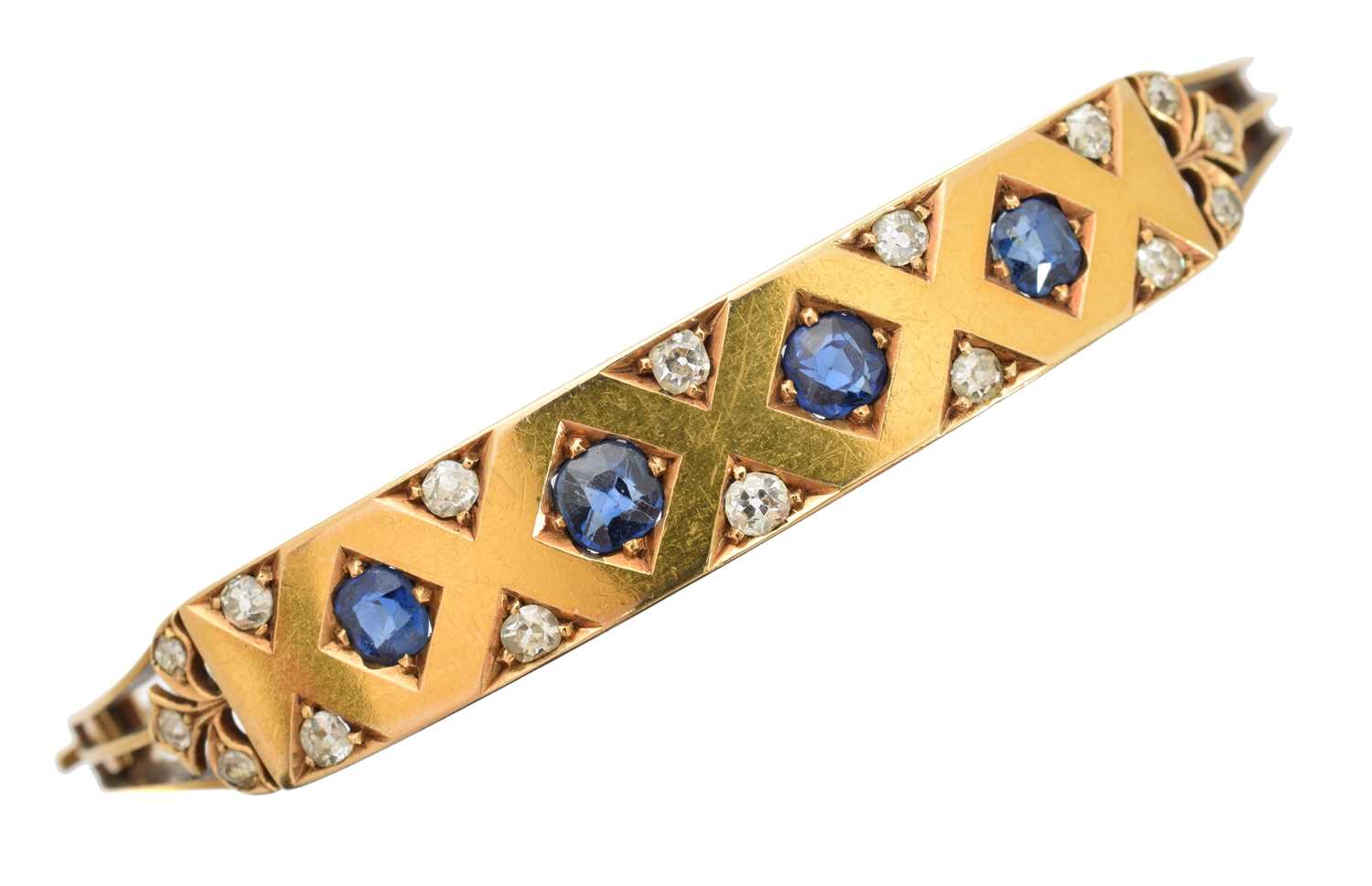 Lot 15 - A Victorian sapphire and diamond hinged bangle
