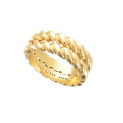 Lot 199 - An 18ct gold diamond band ring by Van Cleef & Arpels