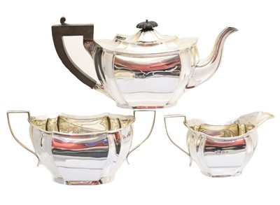 Lot 214 - A George V silver three piece tea set