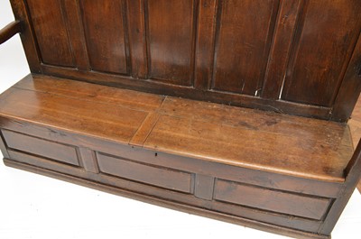Lot 394 - 18th-century oak box settle