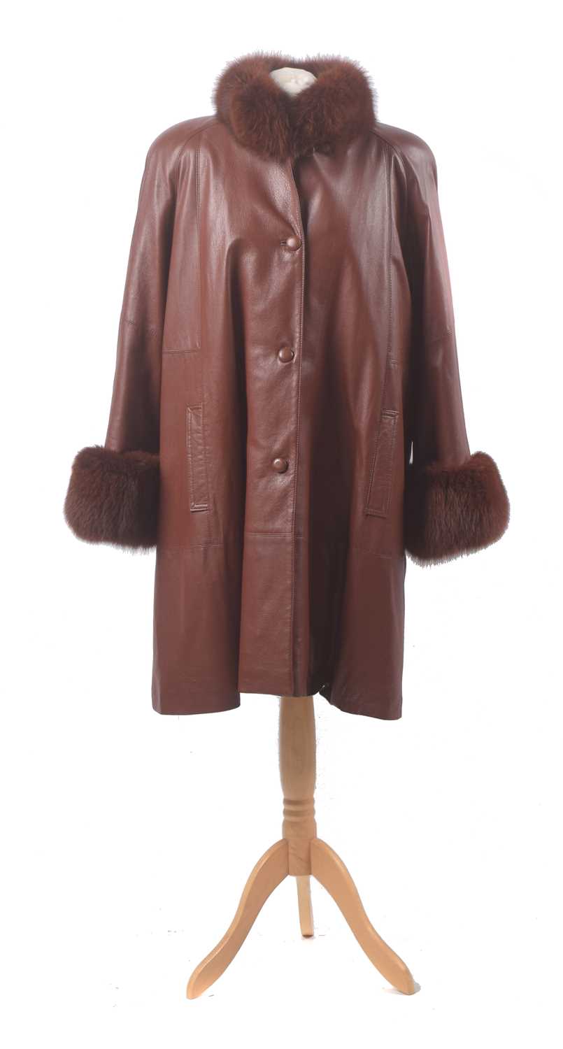 Lot 15 - A leather and fur coat