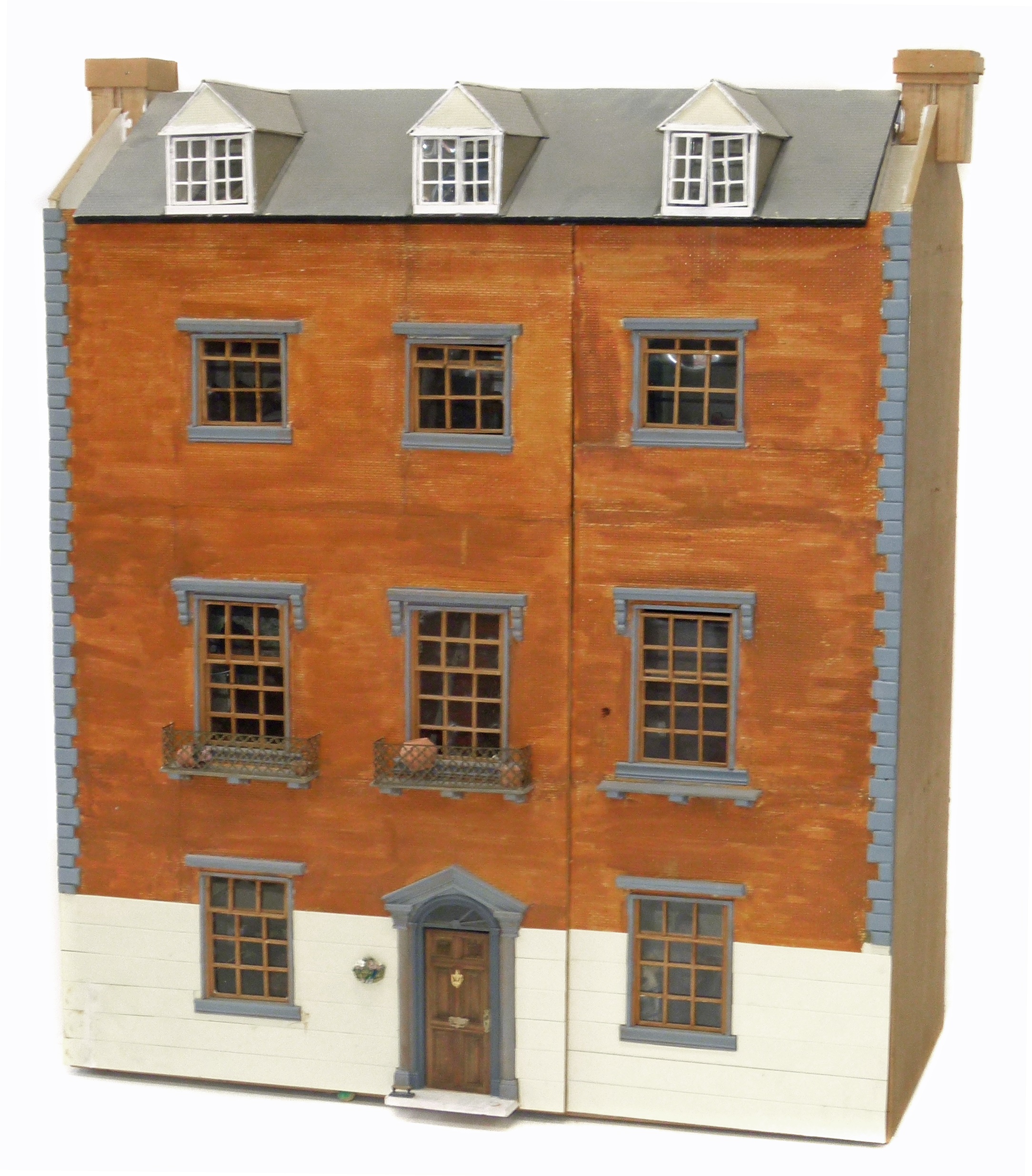 Lot 220 Dolls house in the form of a