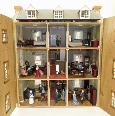 Lot 220 - Dolls house in the form of a Georgian four-story townhouse with furniture and figures.