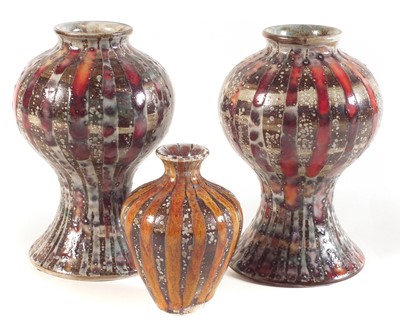 Lot 165 - Pair of Cobridge vases and one other.