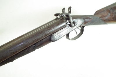 Lot 95 - Thompson of Hexham 12 bore pinfire double barrel shotgun with a period case.