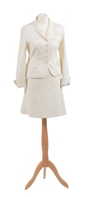 Lot A white suit by Moschino