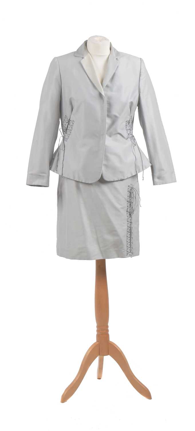 Lot 63 - A grey suit by Moschino