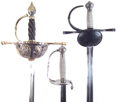 Lot 345 - Two modern replica rapiers and a court sword