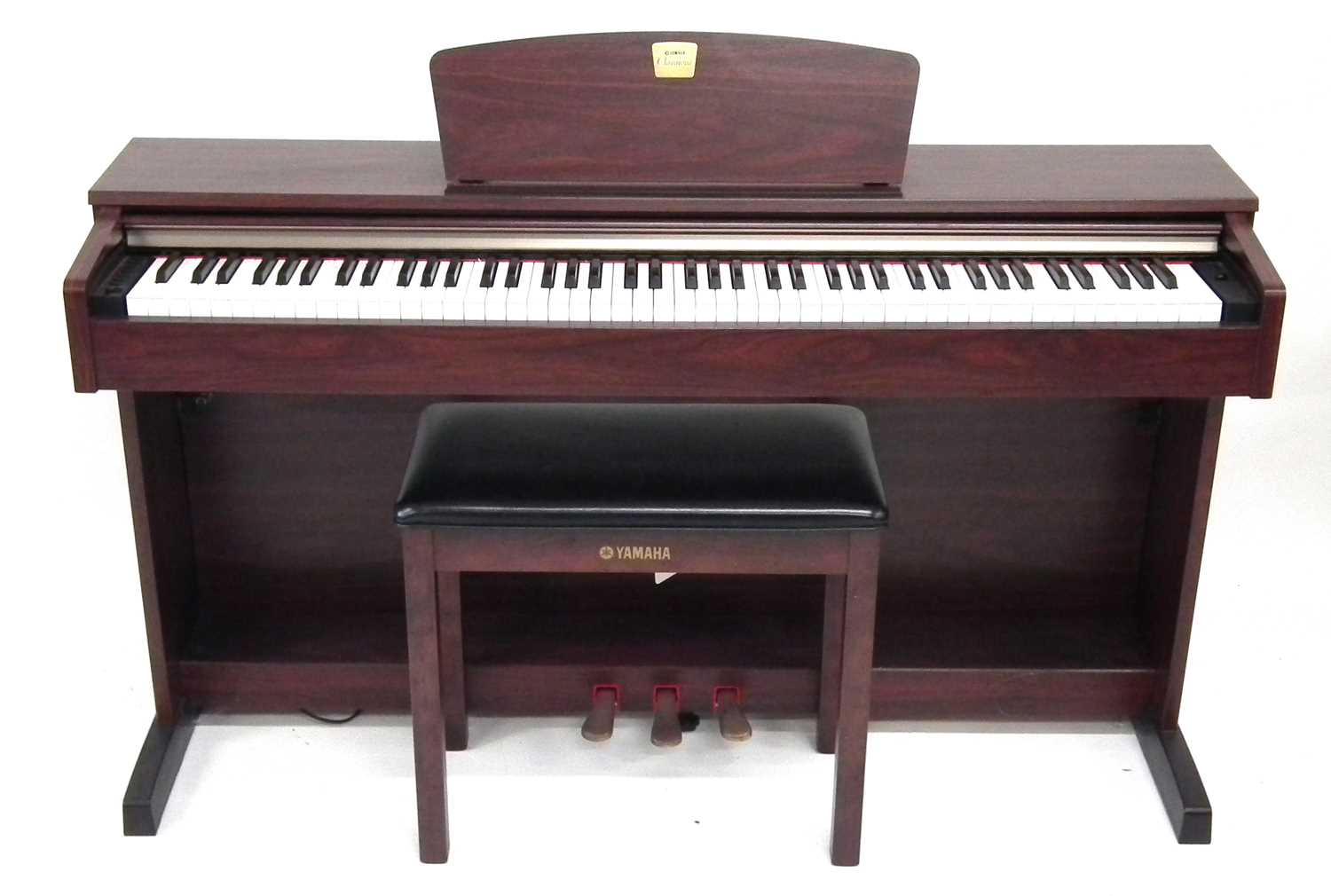 Lot 23 - Yamaha Clavinova electric piano, with stool and Sanyo headphones.