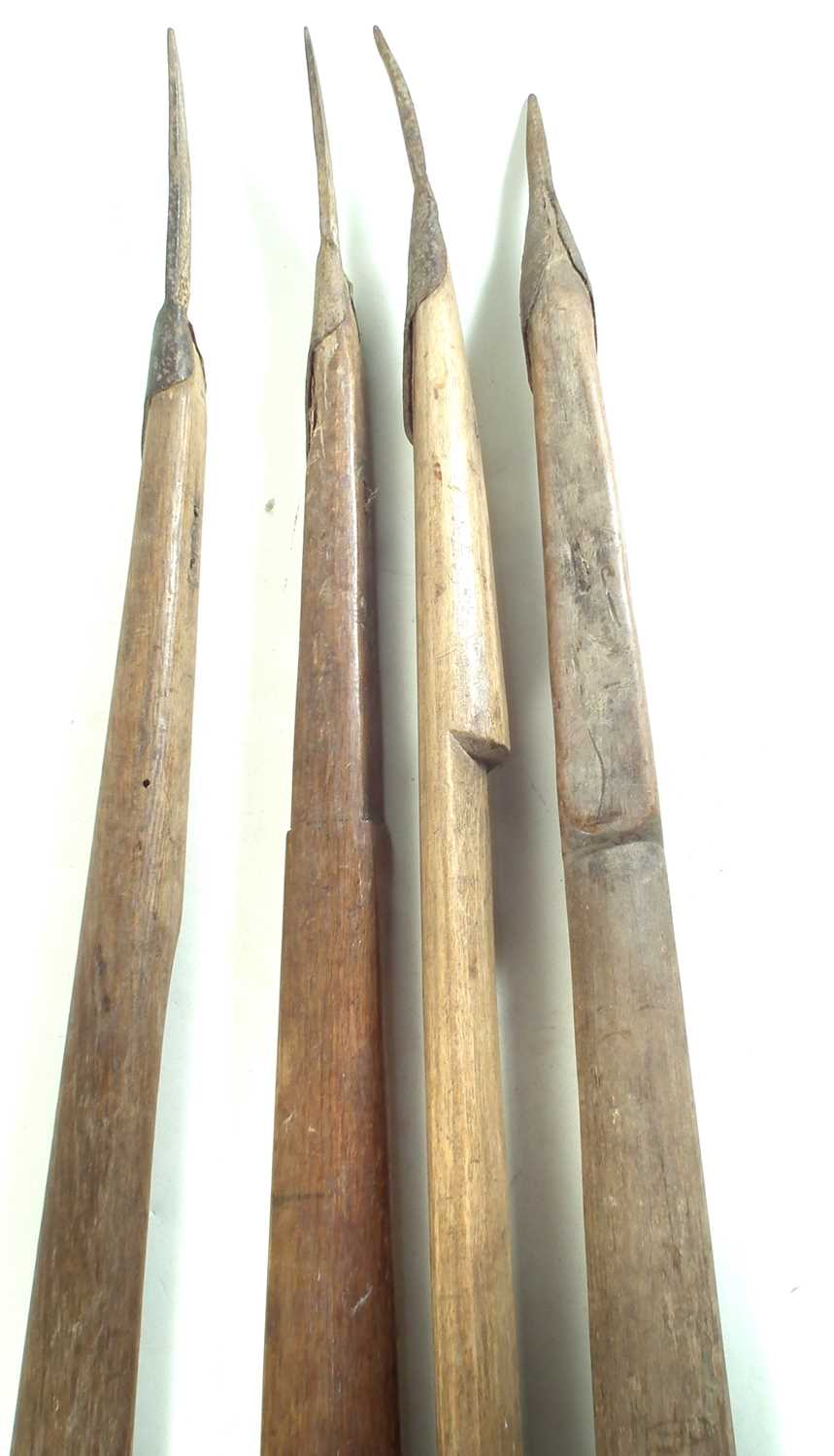 Lot 228 - Four double ended spears possibly for fishing