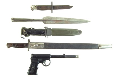 Lot 327 - Two bayonets, trench knife and spear head and a Gat pistol.