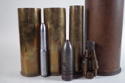 Lot 314 - Four shell cases, section mortar fuse, drill round and one other bullet head