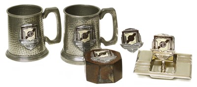 Lot 70 - Two pewter tankards North West Centre MG etc.