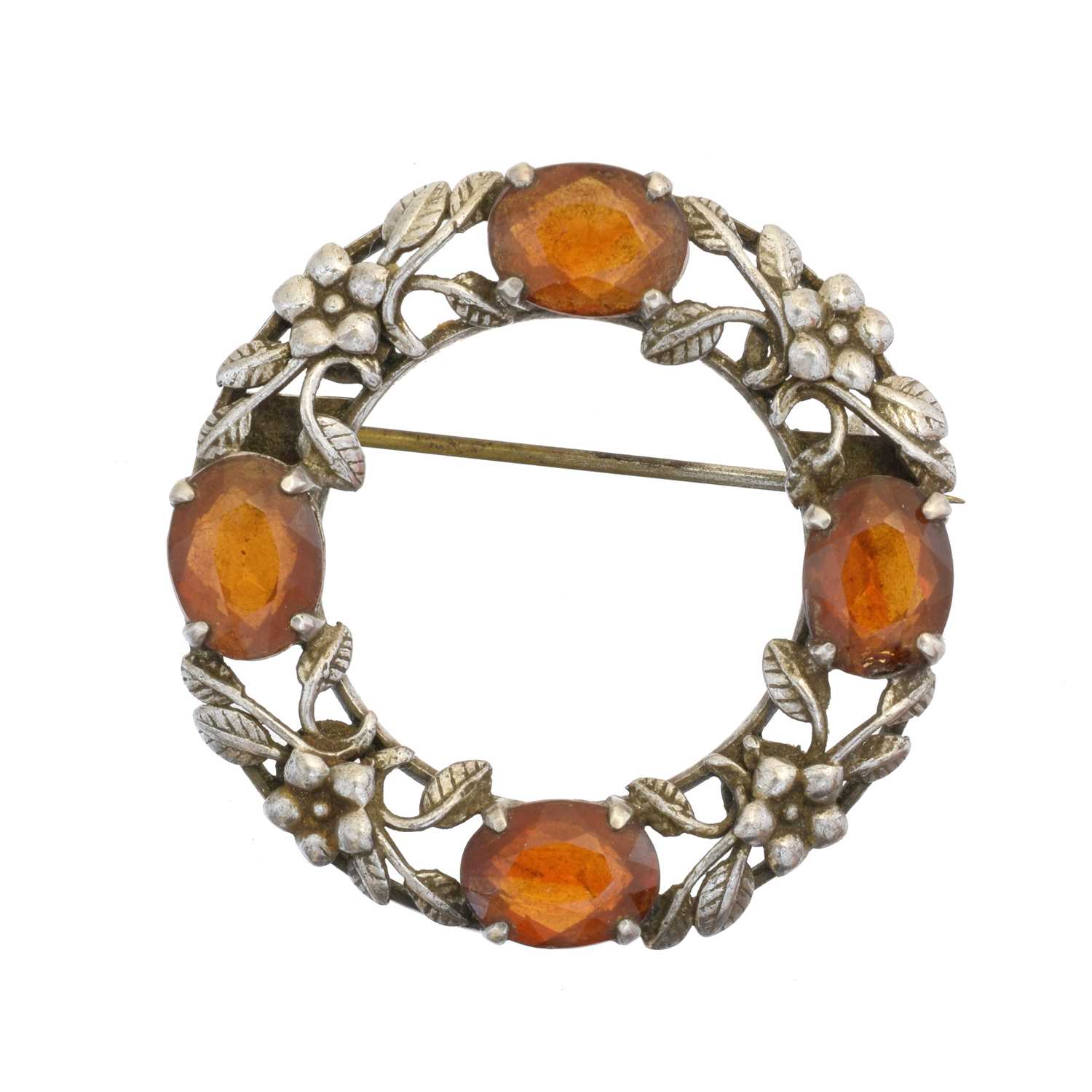 Lot 11 - An Arts & Crafts style citrine brooch