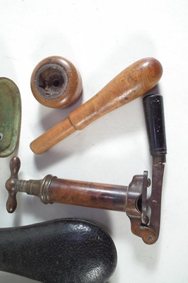 Lot 219 - Vintage shotgun reloading tools and two powder flasks.